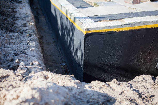 Professional Waterproofing technician working in Knox, IN